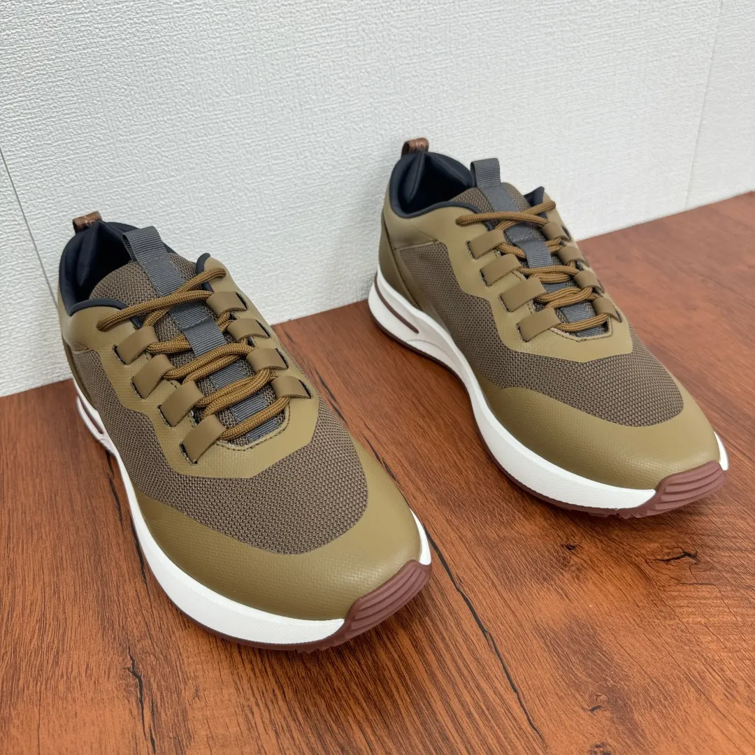 Batch 760 Loro Piana mesh cowhide stitching casual sports men's shoes LP jogging shoes OEM original soles feel free to enter the counter! This casual shoe is knitted from Wind fiber, giving it a unique three-dimensional effect. The unique silhouette narrows slightly at the midsection and is embellished with nappa leather details. The lightweight rubber sole and studs on the edge enhance traction and stability, and functional details full of modern aesthetics add a sporty style to the shoe. The upper uses a hot-melt edge-sealing process. The lightweight technical material of the Kummel-colored rubber outsole is inlaid with cushioning pads on the inside of the sole to distribute the weight more evenly and reduce the load during walking. The leather eyelets are directly set on the upper fixed to the sole to ensure stability. The rear is equipped with cushioning pads to improve wearing comfort. The full package of the counter comes with a shoelace insole. Multiple colors available! Fabric: 100% nylon Decoration: 100% cow leather Accessories: 100% polyurethane Size: 39-40-41-42-43-44 Standard leather shoe size (38/45 can be customized and returns and exchanges are not supported) Item number: FAM1718 brown green